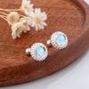 Nuevos aretes redondos de piedra lunar estilo coreano exquisitos frescos dulces de alta gama elegantes personalizados aretes de moda