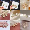 Pendientes 2022 Nueva Moda Piedra Ojo de Gato Pendientes adelgazantes que reducen la edad con pendientes de temperamento de moda súper brillantes