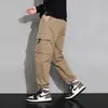 Calças Cargo Outono 2025 Masculinas Esportivas Tamanho Grande Largas Marca Tendência Harem Moda Mais Fácil de Combinar Estilo Coreano Calças Casuais Tendência Jovem