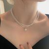 Collar de perlas de doble capa para mujer, diseño avanzado, estilo nicho, nuevo, popular, ligero, de lujo, con temperamento francés, cadena de clavícula.