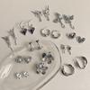 ¡Diablo! Aretes de flores de metal líquido de moda nicho viento frío aretes moda temperamento aretes ins