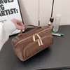 Bolsa de Cosméticos Portátil para Mujer 2026 Nueva Bolsa de Almacenamiento de Cosméticos Partitionada de Gran Capacidad Bolsa de Aseo para Viajes de Negocios