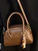 Bolsa Nova de Inverno 2025 Estilo Vintage Almofada para Mulheres, Bolsa Transversal Estilosa, Bolsa de Mão Tendência de Nicho, Bolsa de Boliche para Mulheres