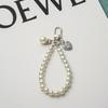 Nuevo Llavero Teléfono Móvil Lazo Pulsera de Perlas Ins Simple Estilo Chanel Moda Boutique Colgante para Teléfono Móvil Bolso