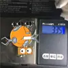 Llaveros de metal hechos a medida con diseños únicos de aleación, basados en imágenes proporcionadas; adornos metálicos de dibujos animados; Regalos de memoria USB con marca impresa
