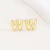 Pendientes de letras de burbuja lisas con baño de cobre y oro real transfronterizos, moda, temperamento, Joker, nuevos pendientes exquisitos, venta al por mayor
