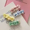 Pinza floral para el pelo de estilo dulce y femenino, modelo nuevo 2026, pinza lateral para flequillo delantero atmosférica, accesorio para el pelo versátil