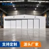 Fabricante de puertas grandes para hangares de aeronaves, ofreciendo puertas correderas para hangares y puertas industriales para hangares hechas a medida en tamaños extragrandes