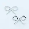 Broche de lazo de perla pin de aleación joyería pinza para el cabello material DIY accesorios para ropa accesorios fabricantes al por mayor