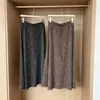 Nueva falda de punto estilo casual línea A para mujer, Otoño 2026, de cintura alta, estilizante, fluida, de longitud media, elegante falda recta