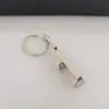Fabricante en stock regalo pequeño práctico Llavero forma de Cola Logo de Coche abridor de botellas nuevo patrón láser