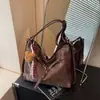 Bolso de hombro de mujer de alta costura transfronterizo de moda, mochila retro simple casual multifuncional de gran capacidad nueva
