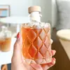 Botella de vidrio para café de extracción en frío creativa y hermosa botella pequeña de vino sellable práctica botella vacía para subempaquetado de vino de frutas casero