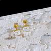 Fábrica de punto de acero de titanio oreja de uñas de color esmalte de uñas chapado en oro de 18 quilates de alta calidad nueva marea pequeña oreja de uña