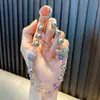 Cadena para teléfono móvil con cuentas de mariposa acrílica funda para teléfono móvil llavero colgante amigas llavero de cristal pequeños regalos al por mayor