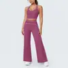 Conjunto de yoga esportivo feminino com top regata de tecido escovado estilo europeu e americano com blocos de cor e gola U, calça de yoga justa, calça pantalona de cintura alta.