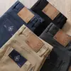 Pantalones vaqueros casuales rectos clásicos de algodón elástico lavado de alta gama con bolsillos rectos para hombre, otoño e invierno 2023, combinan con todo