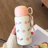 Taza aislada de acero inoxidable de grado médico, vaso de agua de alta apariencia de grado alimenticio para estudiantes, vaso portátil con popote, lindo al por mayor