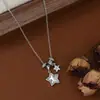 Corrente Elegante para Clavícula Banhada a Ouro Real com Zircônia Micro-Incustada para Mulheres, Colar Estrela de Cinco Pontas em Concha Natural de Design de Nicho Atacado