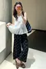 Traje de verão super estiloso: um conjunto completo de top sem mangas estilo coreano feminino e calça pantalona de bolinhas nove pontos conjunto de moda