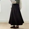 Falda midi de punto minimalista estilo coreano para mujer, nueva colección otoño/invierno 2026, de cintura alta, adelgazante, corte holgado, falda línea A suave y cómoda con dobladillo acampanado
