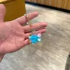 Chaveiro de acrílico transparente com areia movediça de desenho animado, pingente de bolsa, pequeno presente para crianças, decoração de carro