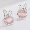 Nuevos aretes de tuerca de oreja de conejo lindos de nicho de lujo ligero joyería para la oreja forma de conejito diseño asimétrico simple regalo para niña