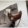 Bolso Minimalista de Hombro Tipo Dumpling para Mujer 2025 Moda Coreana Bolso de Hombro Versátil Bolso Pequeño Cruzado Retro de Nicho de Gama Alta