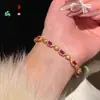 Joia de Pulseira Estilo Loja de Ouro Vintage em Forma de Ovo de Pombo com Zircônia Inlaid Pedra Preciosa de Cor Antiga Corindo Vermelho Retro Cabochão para Mulheres