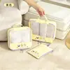 Set de organizadores de viaje de dibujos animados, incluye tres piezas: un organizador de equipaje, un organizador de ropa y un organizador de lencería, con una bolsa de malla portátil