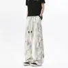 Calça jeans casual reta tie-dye estilo hip-hop americano para homens, calça longa de corte solto, calça jovem moderna de alta qualidade em preto e branco