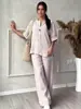 Conjunto de dos piezas para mujer transfronterizo, cuello redondo, un solo botón, top holgado de manga corta + pantalones de pierna ancha de cintura alta, conjunto casual holgado