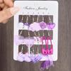 Traje de pendientes cruzados nuevo morado de té de leche de champiñón Amor de Mariposa 12 piezas broche piruleta pendientes de pato