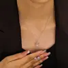 {Set}Aretes y Collar de Aleación de Cobre de Trébol de Cuatro Hojas para Mujer 2025 Simple Accesible Lujo Elegante Diseño de Nicho Cadena para Clavícula