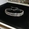 Pulseira Redonda Europeia e Americana Transfronteiriça com Borla e Cravejada de Diamantes, Pulseira Minimalista Moderna de Estilo Nicho com Design Único, Joia de Mão de Nicho