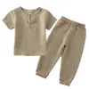 Traje de verano de algodón y lino de manga corta para niños y niñas, delgado, color liso, gasa de algodón, leggings, conjunto holgado de dos piezas, venta al por mayor
