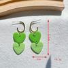 Calle popular transfronteriza. Pendientes verdes del Día de San Patricio, diseño de nicho, pendientes de temperamento de mujer de alta calidad, venta al por mayor
