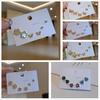 Pendientes de una semana de pequeño lujo de alta gama, juego de seis piezas con aguja de plata S925, combinación con pendientes pequeños para mujer