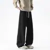 Pantalones de chándal grises oscuros con dobladillo curvo para hombre, pantalones deportivos de estilo americano rectos y holgados para otoño, pantalones casuales versátiles de moda con una bonita caída