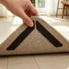 Pegatinas fijadoras antideslizantes para alfombras y tapetes transfronterizos, pegatinas triangulares reutilizables sin marcas para alfombras para uso doméstico, pegatinas antideslizantes para alfombras