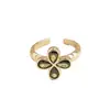 Anillo retro floral en tono café dorado, una pieza lujosa y única con un aire de alta gama, diseñado para apilar, con un borde de encaje, y perfecto para el dedo índice, ofreciendo un estilo moderno e individual