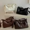 2026 Bolso Cruzado de Un Solo Hombro de Color Sólido Nuevo Simple Moderno Individual Elegante Alto Valor para el Trabajo Bolso de Nicho de Moda