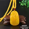 Venta al por mayor de fábrica colgante de resina imitación cera de abeja aceite de pollo gota de agua collar bolsa de la suerte cadena para suéter joyería larga estilo étnico para hombres y mujeres