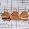 Cesta redonda de imitação de vime Cesta decorativa para casa Cesta de armazenamento de imitação de vime portátil Cesta trançada artesanal Cesta de imitação de vime Atacado