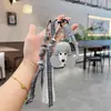 Boneca Filhote de Cachorro de Couro Fofo Corda Artesanal Criativa Couro PU Desenho Animado Chaveiro de Carro Pingente de Decoração para Bolsa de Celebridade da Internet