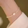 Pulsera de gato de concha de cristal blanco diseño de nicho femenino pulsera de amigas pulsera de belleza dulce de fritilaria