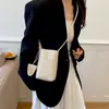 Bolso de teléfono de patrón tejido de moda transfronterizo, nuevo bolso pequeño simple de moda de verano 2026, bolso de hombro cruzado de alto valor estético