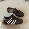 Tênis de Treino Retro Alemão Feminino Vermelho 2026 Outono Novo Casual Esportivo Board Shoes Sola Plana Forrest Gump Pequenos Sapatos Brancos Sapatos Femininos