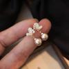 Pendientes de perlas elegantes de alta gama para mujer, de estilo moderno y versátil, con diseño de mariposas, accesorios para las orejas.