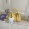 Bolso tipo cubo simple y elegante para mujer, estilo coreano, adecuado para el trabajo y para ir al trabajo, bolso de hombro, nuevo bolso cruzado de moda 2026 para mujer
